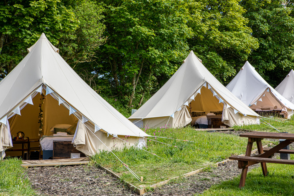 bell tents with benches